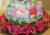 pink and green diaper cake