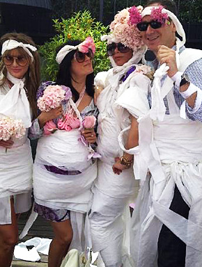 Victoria Beckham and Friends dress up in toilet paper dresses